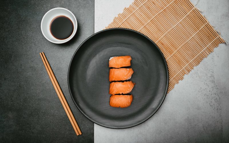japanese-salmon-nigiri-rice-sushi-presented-top-black-plate-with-soy-sauce-chopsticks japanese-salmon-nigiri-rice-sushi-presented-top-black-plate-with-soy-sauce-chopsticks